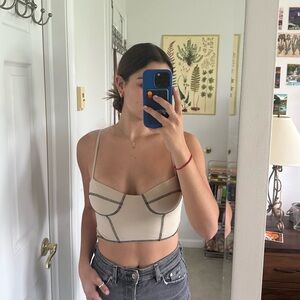 small princess polly tan top with black stitching